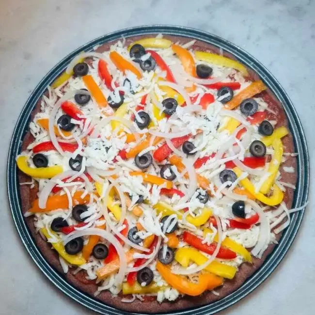 homemade teff-pizza served.