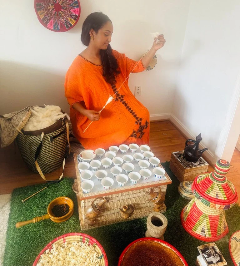 Ethiopian woman preparing the traditional Ethiopian Coffee