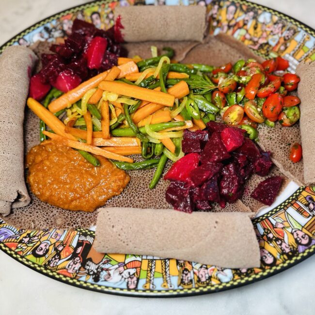 Fossolia dish served with injera