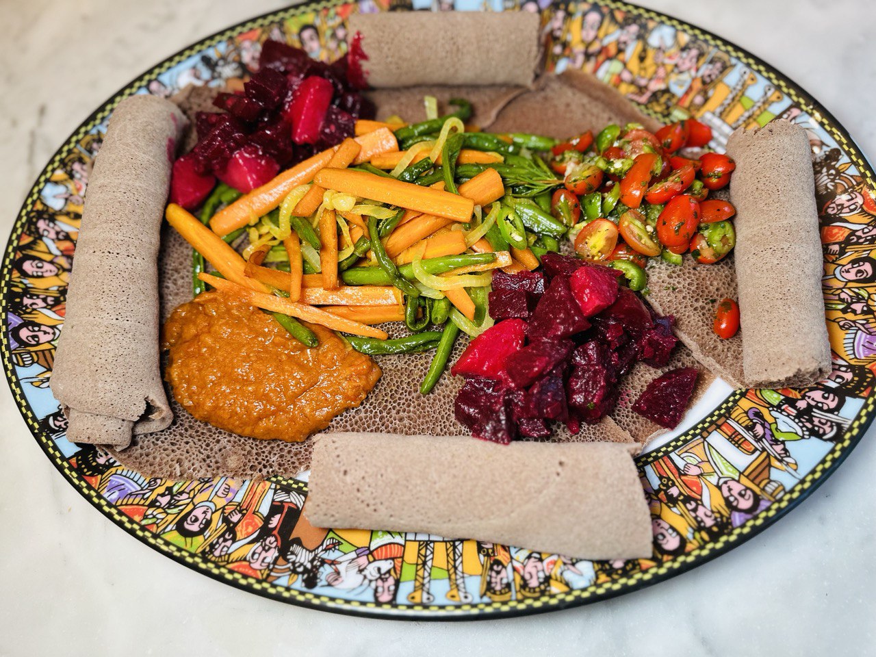 Fossolia dish served with injera